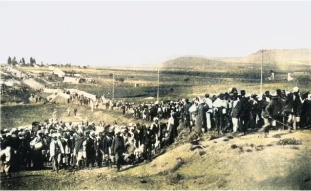 Indian workers marching through Volksrust 1913