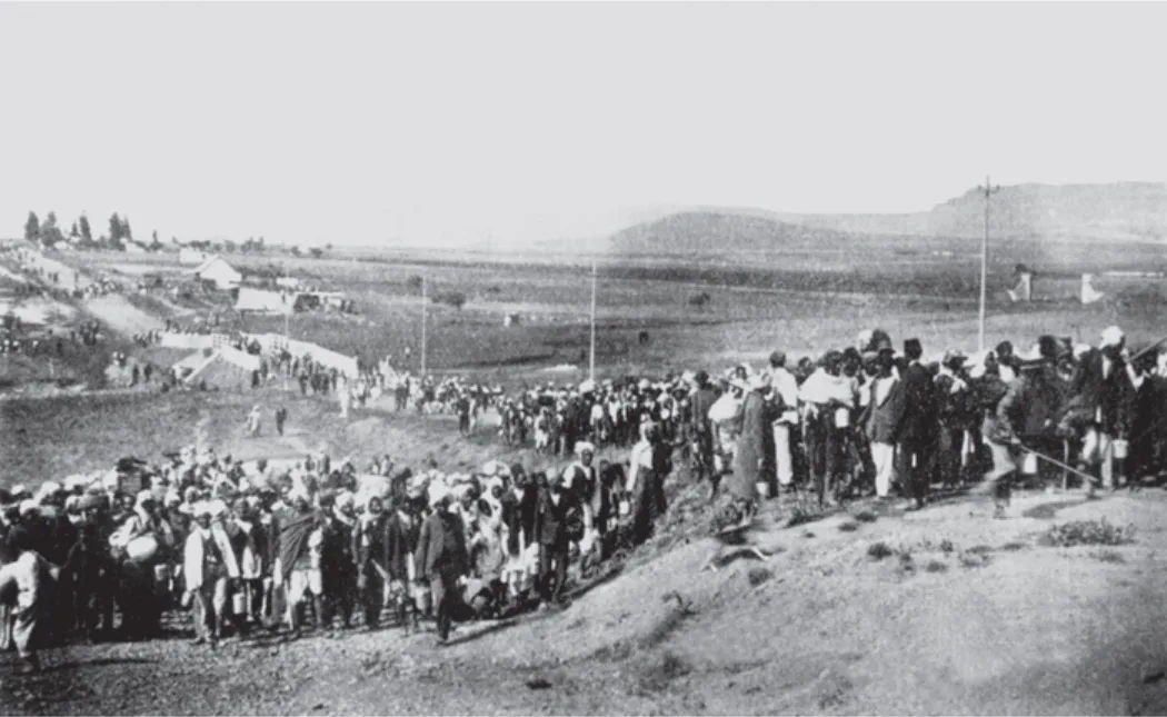 Indian workers march in South Africa led by Mahatma Gandhi 1913